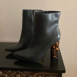 Great condition Express ankle boots. Black with a Carmel and black colored heel